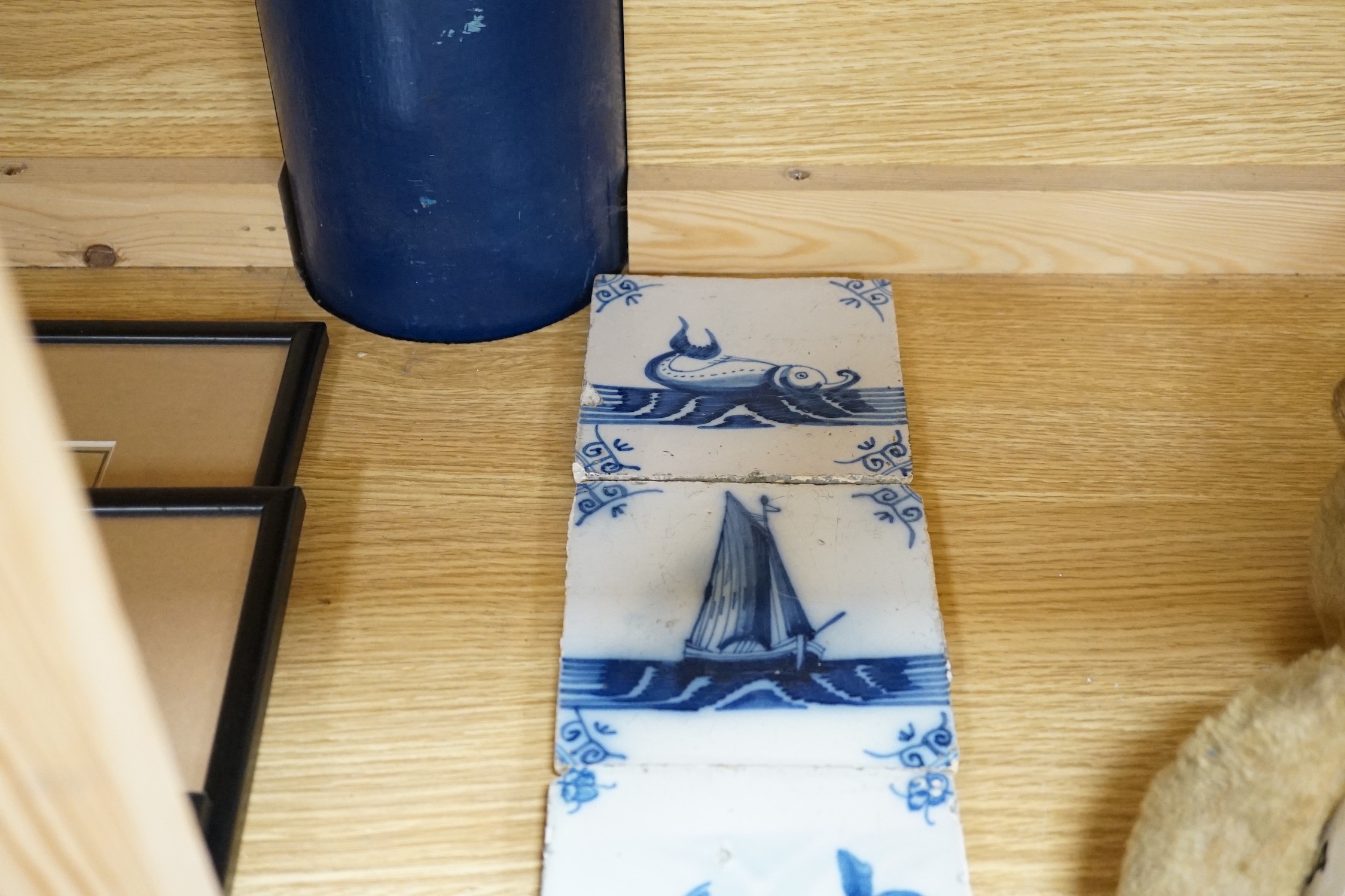 A group of six 18th/19th century blue and white Delft tiles, 13cms square